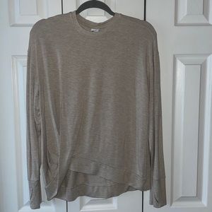 Tan colored sweater with tie detail